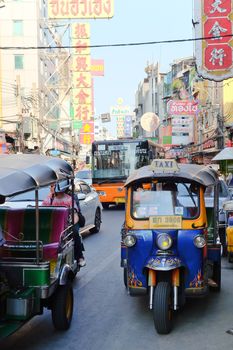 BANGKOK, THAILAND - APRIL24, 2016 : Motorized Tricycle on Yaowarat Road,chinatown of Bangkok, The Motorized Tricycle are a popular way to transport in Yaowarat Road.