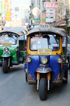 BANGKOK, THAILAND - APRIL24, 2016 : Motorized Tricycle on Yaowarat Road,chinatown of Bangkok, The Motorized Tricycle are a popular way to transport in Yaowarat Road.