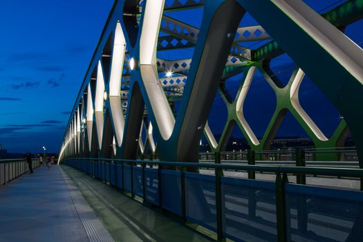 On the place of the oldest bridge in Bratislava, Slovakia, new opened Old Bridge for the trams and pedestrians. Details of the bridge in the night light.