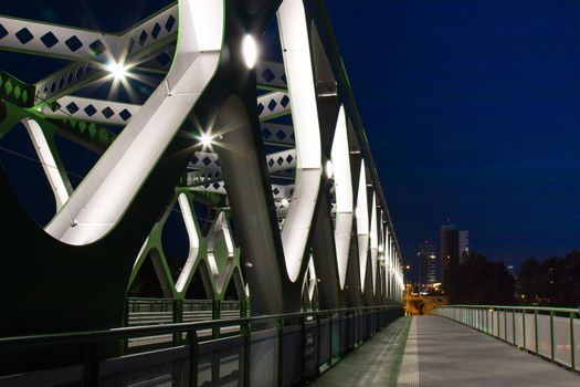 On the place of the oldest bridge in Bratislava, Slovakia, new opened Old Bridge for the trams and pedestrians. Details of the bridge in the night light.