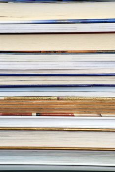 Detail image of stack of books.