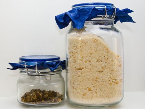 Image of two kitchen jars with mushroom and breadcrumb.