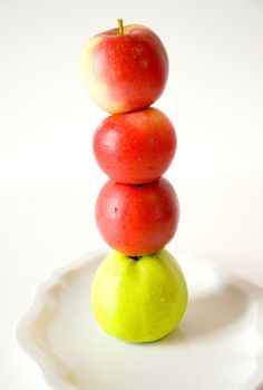 Autumn fruits in the dish on eatch other.