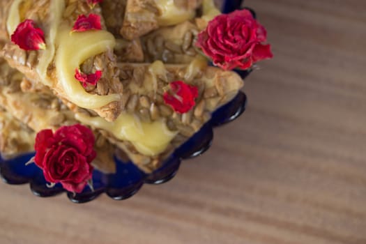 cookie with honey and flowers, wooden table