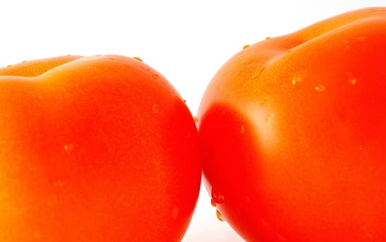 Closeup image of tomato isolated n the white background.