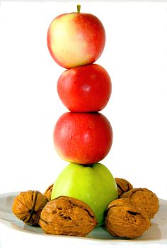 Autumn fruits in the dish on eatch other.