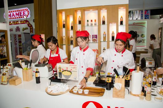 NONTHABURI - MAY 25 : Chefs are cooking demonstrations to visitors in during exhibition of THAIFEX - World of food ASIA 2016 on May 25, 2016 in Nonthaburi, Thailand.