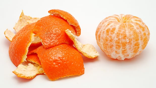 Detail image of mandarine isolated on the white background.