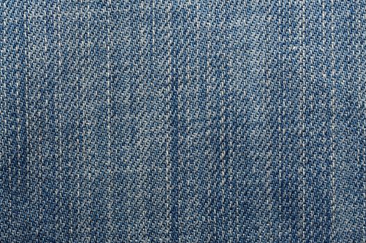 Macro shoot of blue jeans seamless background.