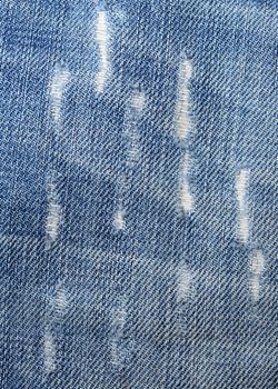 Macro shoot of blue jeans seamless background.