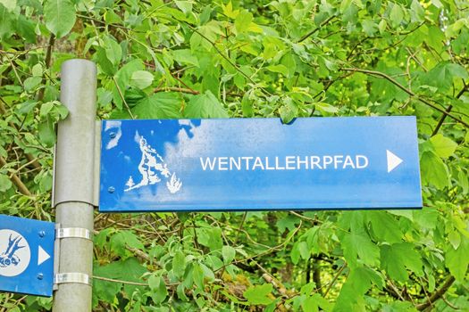 Steinheim, Wental, Germany - May 26, 2016: Wental valley signpost labeled with Wental educationa trail (Wentallehrpfad), Swabian Alps (Schwaebische Alb)