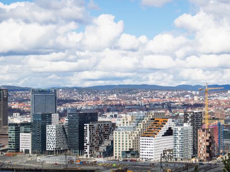 Oslo, Norway - April 10, 2016: The Barcode project, a redevelopment of a former industrial estate in the Bjorvika area of Oslo, Norway, with a row of high-rise office buildings, each with its own individual style.