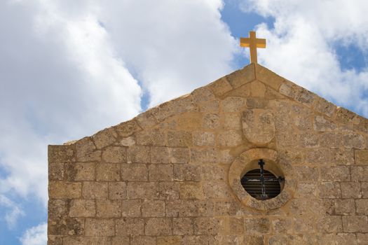 St. Mary Magdalene Chapel was rebuilt on the cliff edge in the seventeenth century. Located in Dingli at the mediterranean island Malta. Intense clouds.