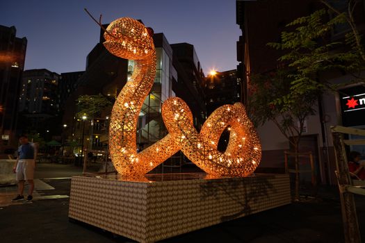 HAYMARKET, AUSTRALIA - 7 FEBRUARY, 2016; The snake one of the Chinese Zodiac signs street display for Chinese New Year celebrations.