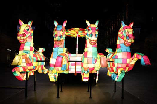 SYDNEY, AUSTRALIA - 7 FEBRUARY, 2016;  Horses pull a chariot for the Chinese New Year animal zodiac, The Horse, which symbolizes enthusiasm and energy. The animal gives people an impression of independence and integrity