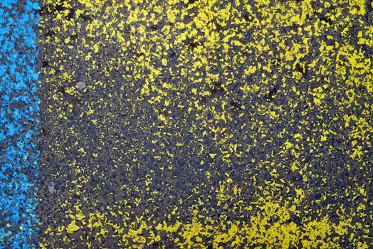 industrial street asphalt grunge yellow and blue paint texture background