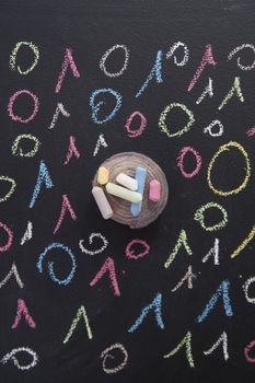 Graphic representation with chalk on blackboard colorful binary code