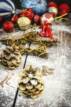 Christmas composition with pine cones and ornaments