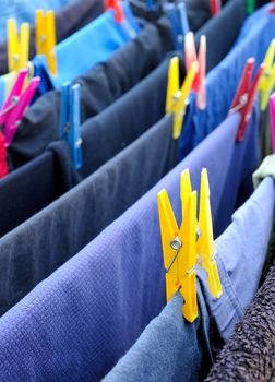 Drying clothes hanged on the clothes horse.