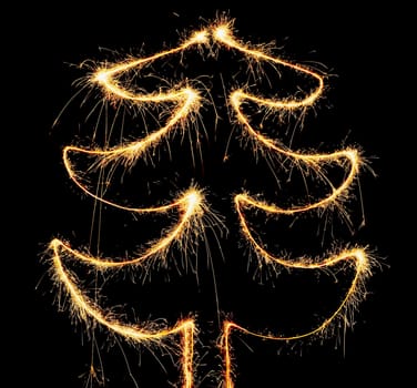 Abstract sparkler christmas tree on the black background.