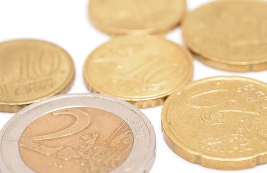 Euro coins placed on the white background.