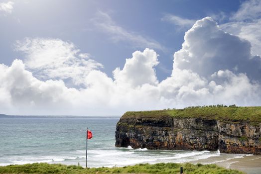 red flag above ballybunion beach in county kerry ireland