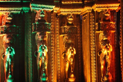 Ancient sculptures made of plaster of paris for decoration of a temple during a traditional festival in India.