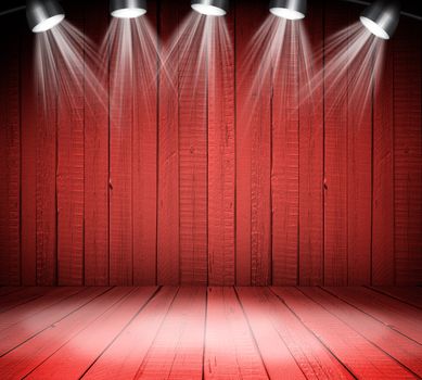 Illuminated empty red concert stage with soffits