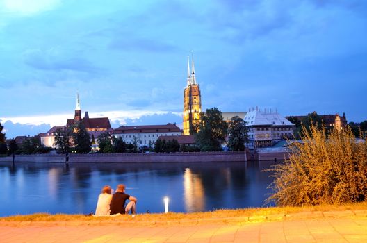 WROCLAW, POLAND - MAY 30: Wroclaw general cityscape by night with Odra river and Cathedral. In 2016 Wroclaw is European Capitol of Culture. 
