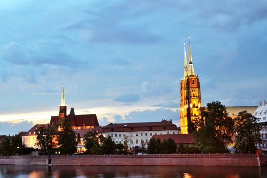 WROCLAW, POLAND - MAY 30: Wroclaw general cityscape by night with Odra river and Cathedral. In 2016 Wroclaw is European Capitol of Culture. 