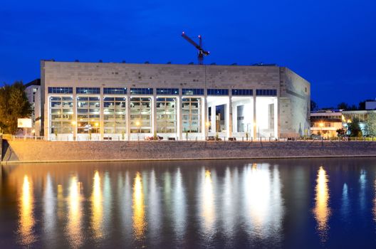 WROCLAW, POLAND - MAY 30: Wroclaw's University Library at Odra river bank by night. In 2016 Wroclaw is European Capitol of Culture. 