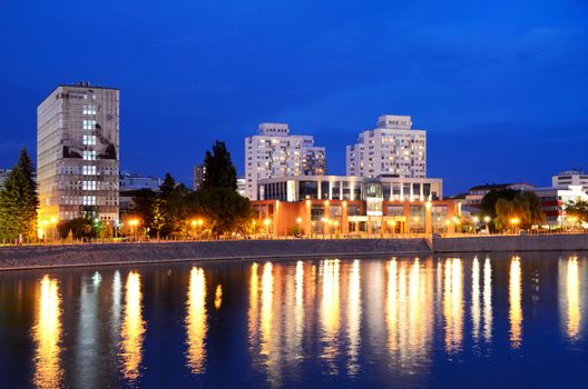 WROCLAW, POLAND - MAY 30: Wroclaw's University, The Chemistry Department at Odra river by night. In 2016 Wroclaw is European Capitol of Culture. 