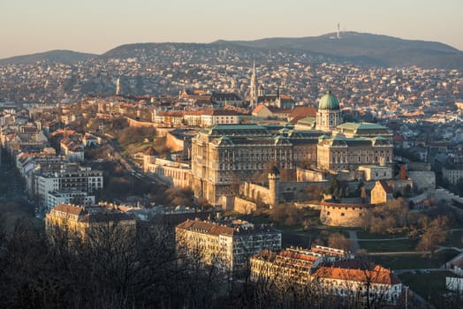 Buda Castle or Royal Palace in Budapest, Hungary Lit by Setting Sun