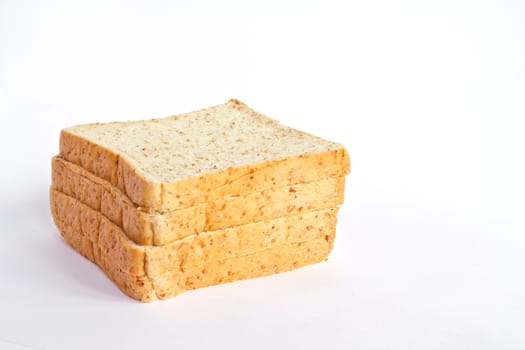 slices of whole wheat bread isolated on white background 