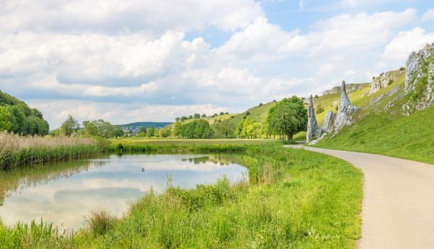 Rock formation "Steinerne Jungfrauen" in valley Eselsburger Tal panorama near river Brenz - jewel of the swabian alps