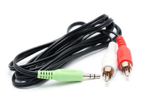 Black audio cable on a white background. One stereo jack and two cinches.