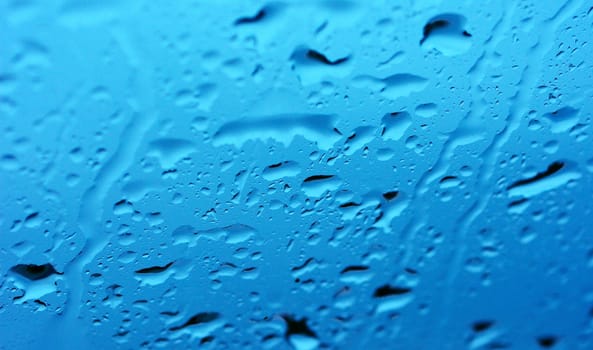 Background shot with rain drops on the window.