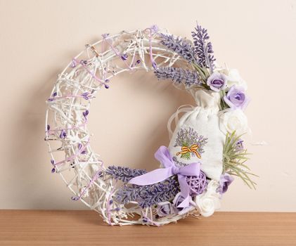 Interior decoration, wicker wreath with lavender and ribbon.