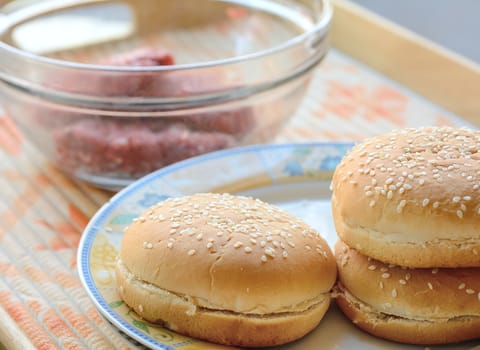 Three fresh buns prepared for the meat - hamburger.