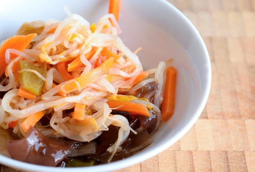 Chinese salad with mungo beans and Jew's ear fungus in a bowl.