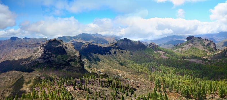 Panoramic shot of Gran Canaria mountains, view from Roque Nublo peak.