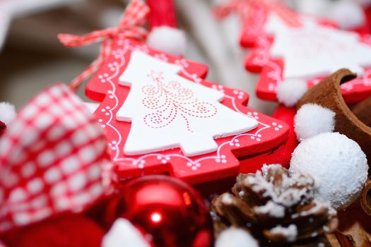 Christmas decoration with red Christmas tree and ribbon.