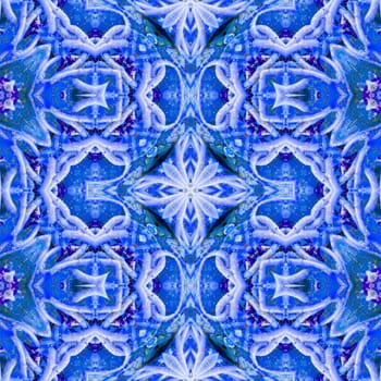 Blue kaleidoscope pattern. Abstract background ideal for wallpaper pattern and other work.