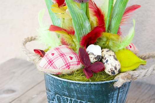 Easter floral home decoration on the table. Homemade arrangement.