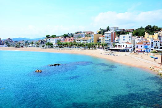 Beach of the seaside town Blanes, part of the Costa Brava destination in Catalonia, Spain.