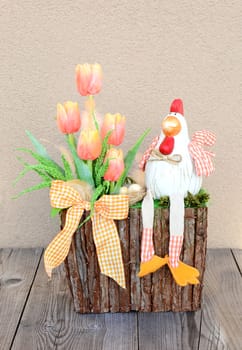 Easter floral home decoration on the table. Homemade arrangement.