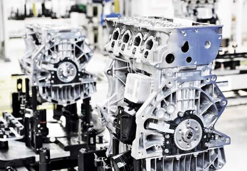 Production line for manufactoring of the engines in the car factory.
