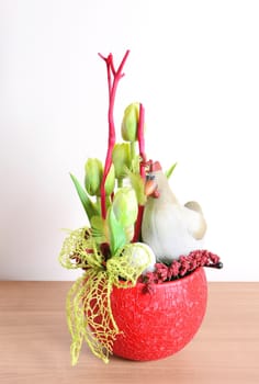 Easter floral home decoration on the table. Homemade arrangement.