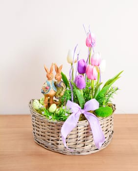 Easter floral home decoration on the table. Homemade arrangement.