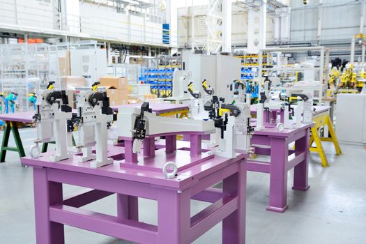 Closeup shot of the machine tools in the factory hall.